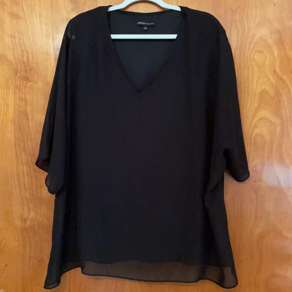 Silky black top with cotton blend under.  Double blouse a large 14..
